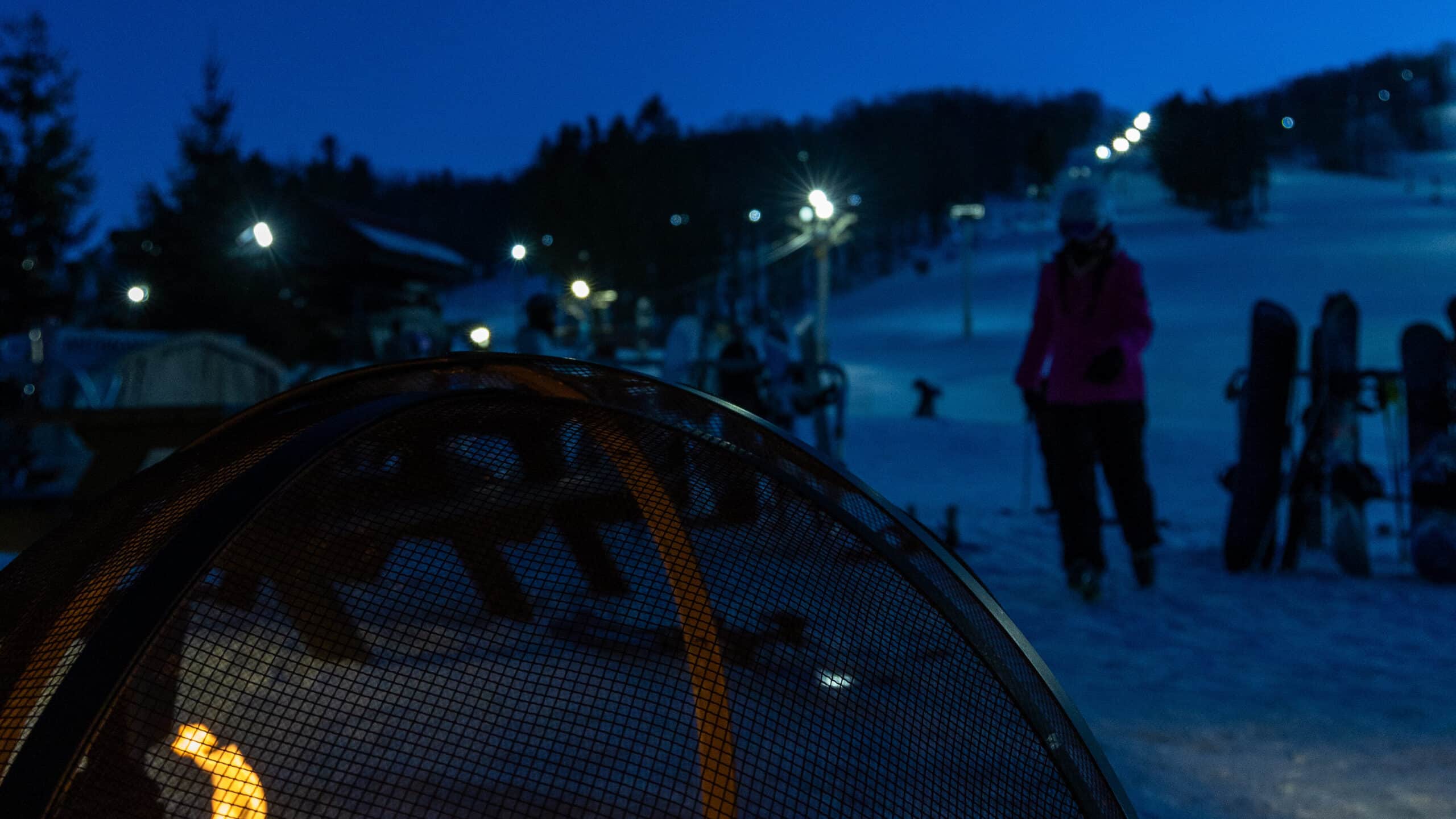 A campfire at Bousquet Mountains lodge at night