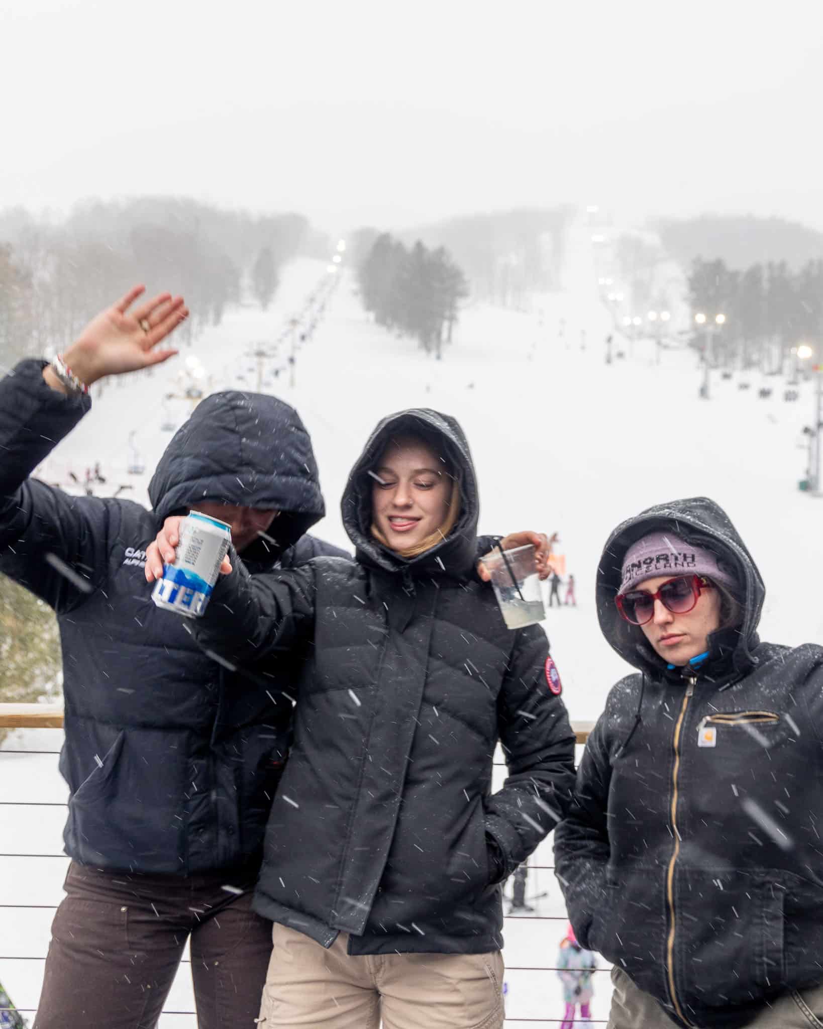 Three friends dancing on the deck at Bousquet Mountain's DJ on the Deck series