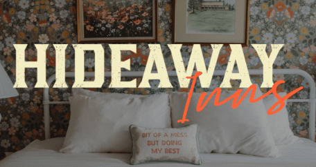 Brand banner for Hideaway Inns with a cozy bedroom scene: floral wallpaper, framed art, a bed with white pillows, and a decorative pillow reading “BIT OF A MESS BUT DOING MY BEST.”